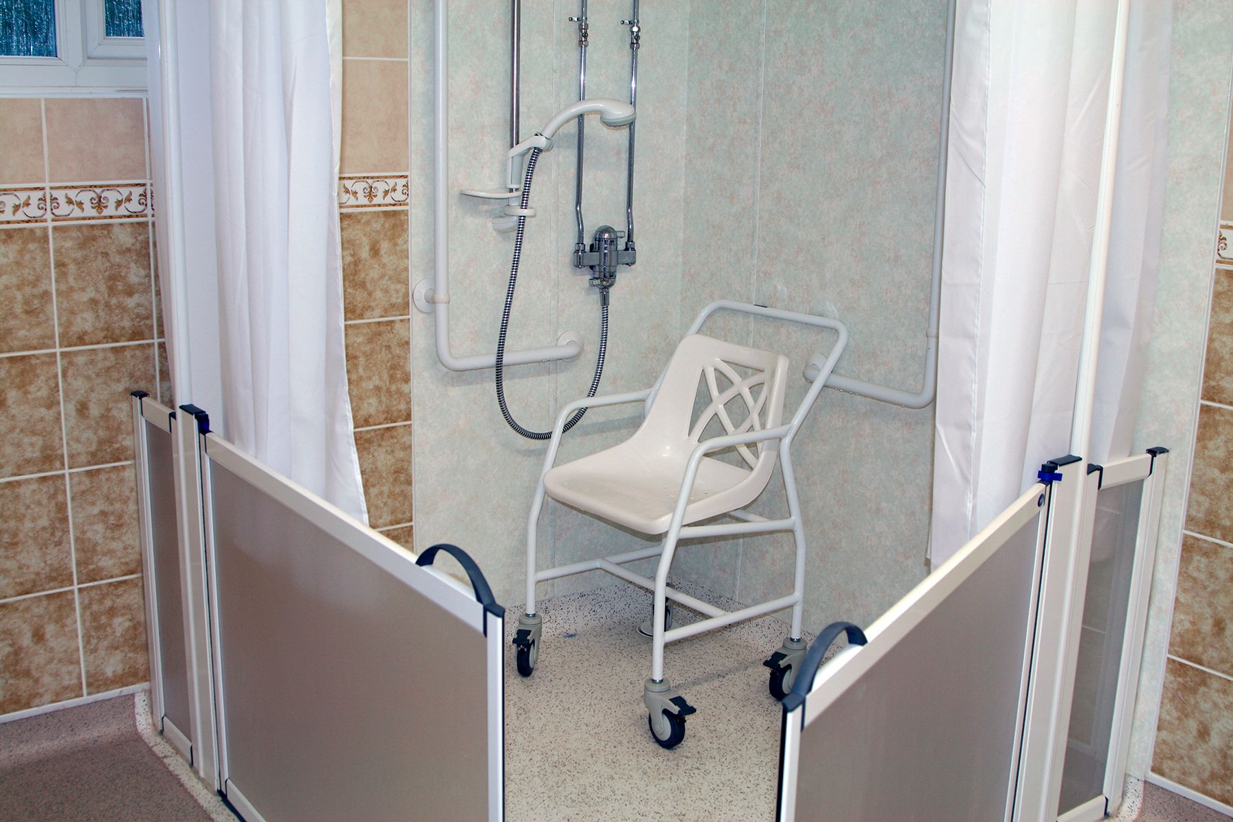 Anapos is our our entry-level wet room, ideal for ensuring safe, accessible bathing within the home.